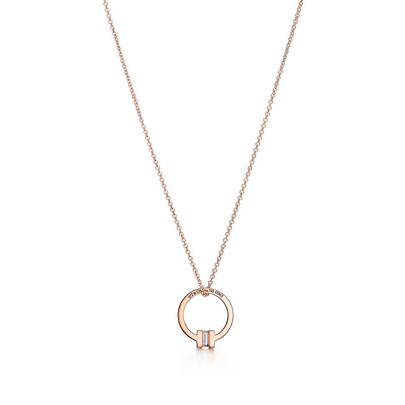 TIFFANY T PENDANT IN 18K ROSE GOLD WITH A BAGUETTE DIAMOND